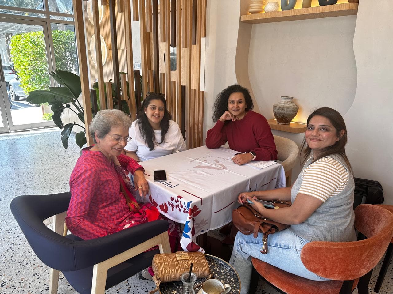 Friendly Mahjong regulars table with players gathered in Dubai