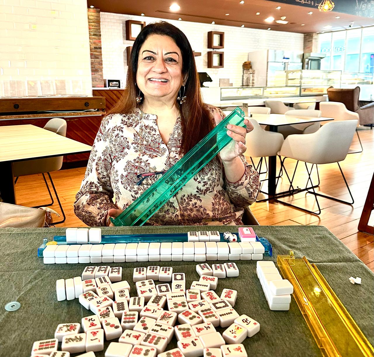 Neha Bali teaching Mahjong at a Dubai class table